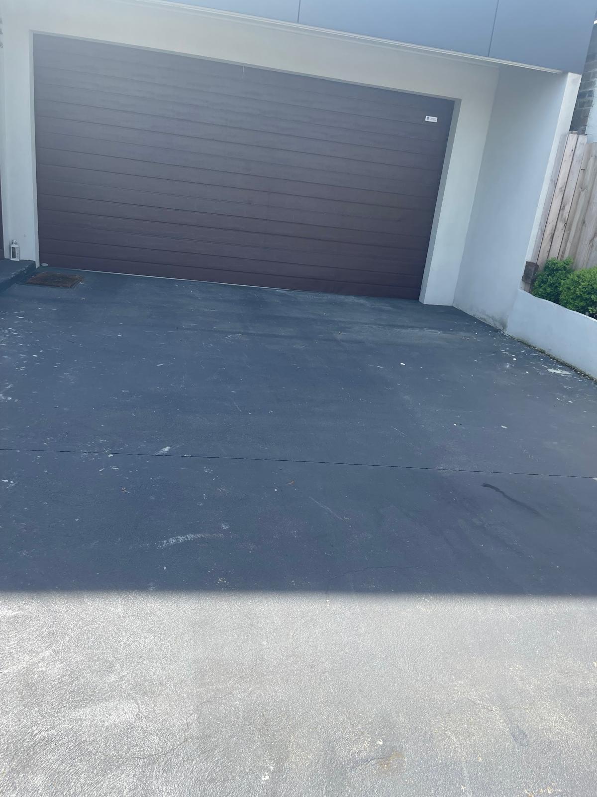 Driveway after epoxy coating with flakes